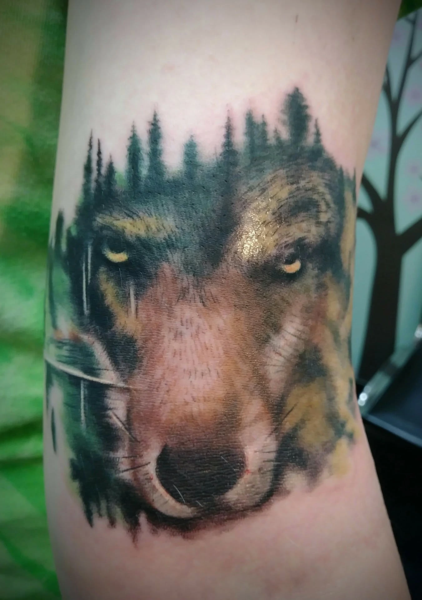 Realistic wolf tattoo artwork